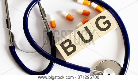Beautiful Stethoscope With Pills .wooden Blocks Bug