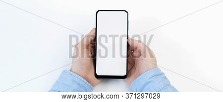 Male Hands Holding Smartphone With Blank Screen On White Background