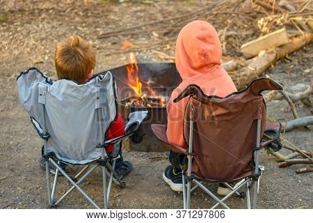 Kids Burning Fire At Kuitpo Forest Camping Ground During Winter School Holidays, South Australia