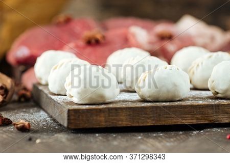Uncooked Raw Manti. Central Asian Traditional Dumplings Meat Dish With Meat, Onion Jusai. Unprepared
