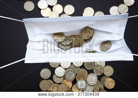 Medical Face Masks And Money Background. World Coronavirus Epidemic And Economic Losses Concept. Con