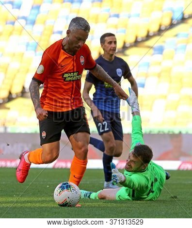 Kyiv, Ukraine - June 6, 2020: Marlos Of Shakhtar Donetsk (in Orange) Attacks During The Ukrainian Pr