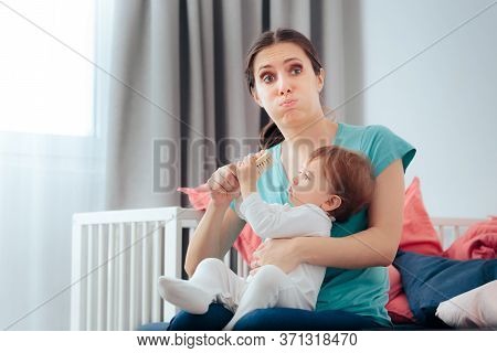 Stressed Mom Holding Naughty Active Baby Feeling Tired