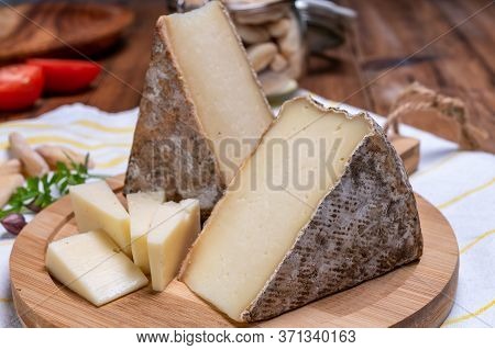 Cheese Tomme De Montagne Or Tomme De Savoie Made From Cow Milk In French Alps.