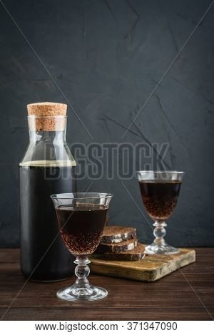 Traditional Russian Drink Kvass Made From Bread, Rye Malt, Sugar And Water. Kvass In Bottle With Rye