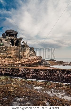 Tanah Lot Temple, The Most Important Indu Temple Of Bali, Indonesia Befor Sunset