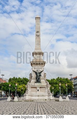 Lisbon, Portugal - July 3, 2019: Monument To The Restauradores At Restauradores Square Lisbon, Portu