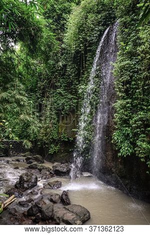The Beautiful  Tibumana Waterfall (air Terjun Tebumana) Near Ubud, Bali, Indonesia