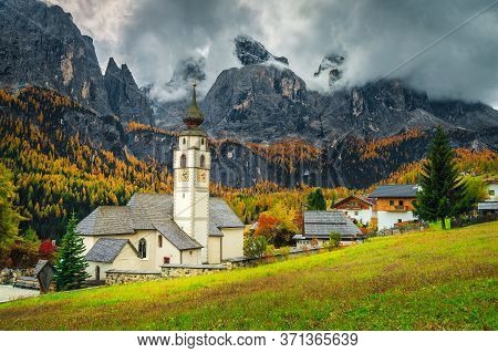 Stunning Autumn Mountain Scenery With Cute Church In The Fabulous Alpine Village, Colfosco, Dolomite