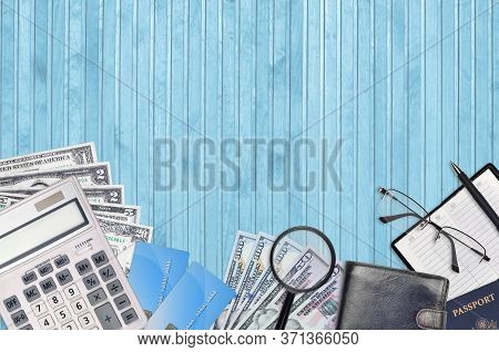 Office Flat Lay Composition With Calculator, Address Book And Other Office Items On Brown Wooden Tab