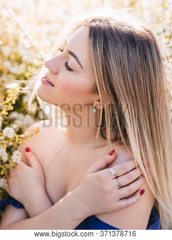 Sensual Calm Portrait Of Beautiful Hipster Woman In Blooming Bush With White Flowers Of Spirea. Copy