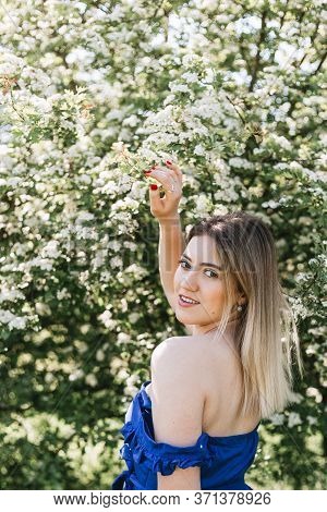 Sensual Calm Portrait Of Beautiful Hipster Woman In Blooming Bush With White Flowers Of Spirea. Copy