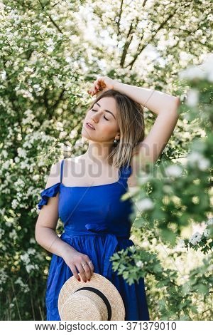 Sensual Calm Portrait Of Beautiful Hipster Woman In Blooming Bush With White Flowers Of Spirea. Copy