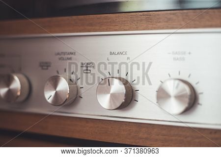 Silver Wooden Vintage Amplifier: Close Up Of Control Knobs