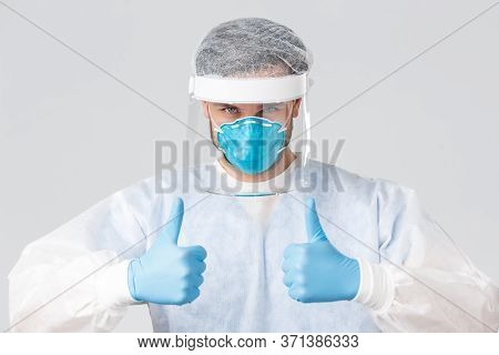 Covid-19, Pandemic, Healthcare Workers Fighting Virus Outbreak. Confident Professional Medical Stuff