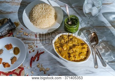 Authentic Indian Almond Chicken Korma Curry Dinner With Basmati Rice And Green Chutney