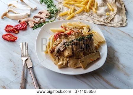 Creamy Italian Chicken Marsala With King Oyster Mushrooms And Sundried Tomatoes Served Over Penne Ri