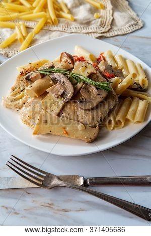 Creamy Italian Chicken Marsala With King Oyster Mushrooms And Sundried Tomatoes Served Over Penne Ri