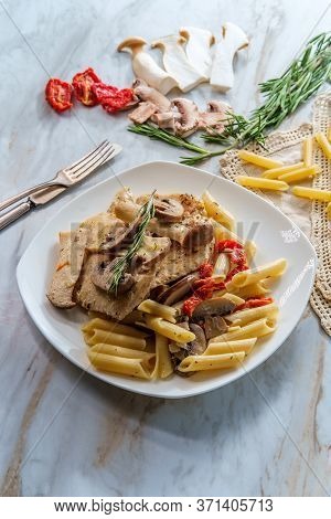Creamy Italian Chicken Marsala With King Oyster Mushrooms And Sundried Tomatoes Served Over Penne Ri