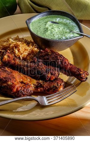 Peruvian Chicken Legs With Aji Verde Green Cilantro Sauce And Fried Rice
