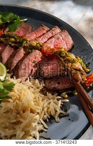 Rib-eye Steak Cooked Rare With Hot And Spicy Thai Crying Tiger Sauce Also Called Suea Rong Hai