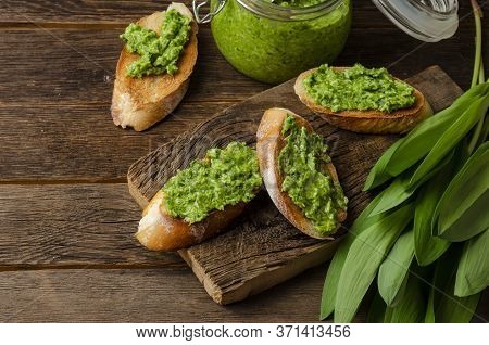 Fresh Ramson Wild Garlic Pesto On White Background With Toasts