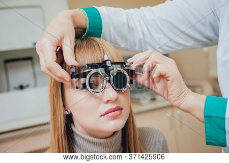 Trial Frame. Glasses For A Young Woman. Ametropia Correction With Glasses.