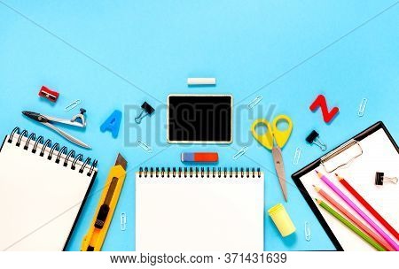 Back To School Concept Notepad, Pencil Case And Stationery And School Supplies. Top Horizontal View 