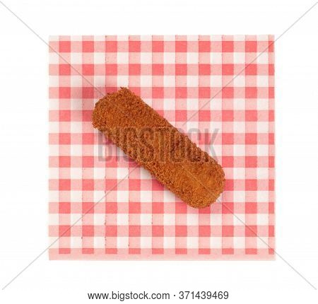 Brown Crusty Dutch Kroket On A Red Napkin Isolated On A White Background