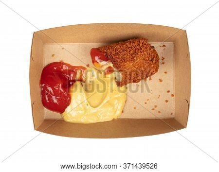Partly Eaten Brown Crusty Dutch Kroket With Mustard And Ketchup Isolated On A White Background