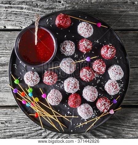 Sugar-free Vegetarian Dessert: Berry Bliss Balls With Desiccated Coconut Mixed With Peanut Butter An