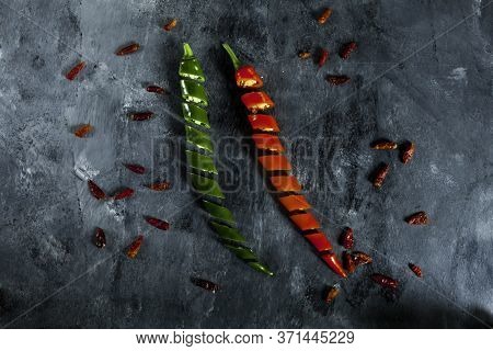 Fresh Spicy Green And Red Peppers Sliced And Cayenne Peppers