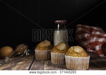 Three Delicious Cupcakes, Eggs And Napkin