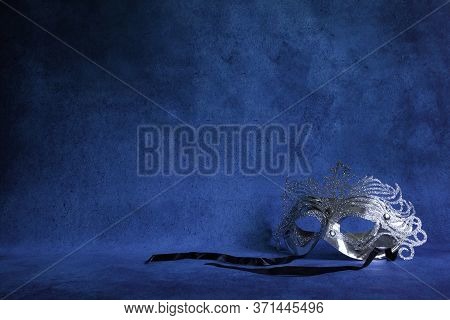 Silvery Carnival Mask On Blue
