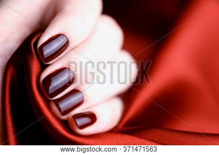 Manicure With Burgundy Color Nails On Burgundy