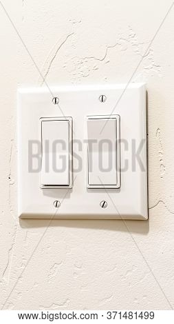 Vertical Crop Indoor Multiple Rocker Light Switch With Broad Flat Levers And Cover Plate