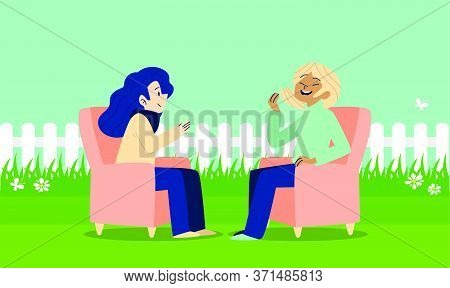 Girls Are Sitting In A Garden And Talking To Each Other