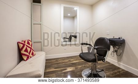 Panorama Hairdresser Chair And Backwash Shampoo Bowl Inside Salon With Bench And Mirror
