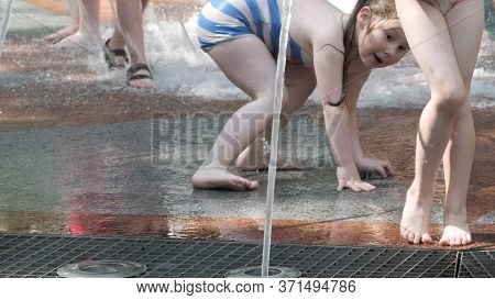 Gomel, Belarus - June 10, 2020: Children Bathe In A Fountain In The Park Gromyko