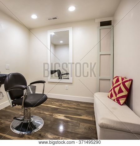 Square Hairdresser Chair And Backwash Shampoo Bowl Inside Salon With Bench And Mirror