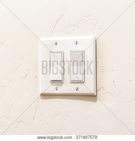 Square Indoor Multiple Rocker Light Switch With Broad Flat Levers And Cover Plate
