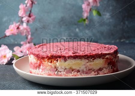 Layered Salad With Herring, Beets, Carrots, Onions, Potatoes And Eggs. 