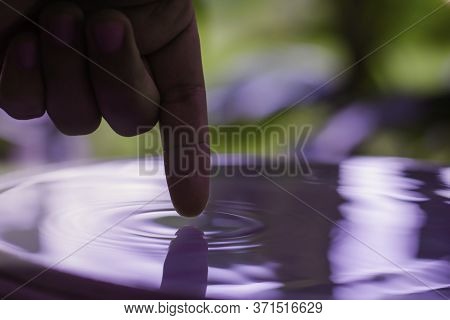 Finger Hand Touce Of Water Surface For Water For Life Concept
