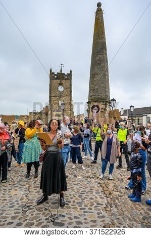 Richmond, North Yorkshire, Uk - June 14, 2020: Blm Protester Leading A Black Lives Matter Protest On