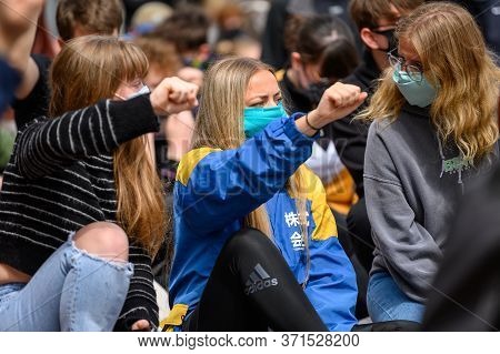 Richmond, North Yorkshire, Uk - June 14, 2020: Caucasian Female Protesters Wear Ppe Face Masks And S