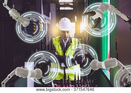 Asian Male Engineer Factory Inspection Computer Control With Hand Robot Ai Machine Assist Production
