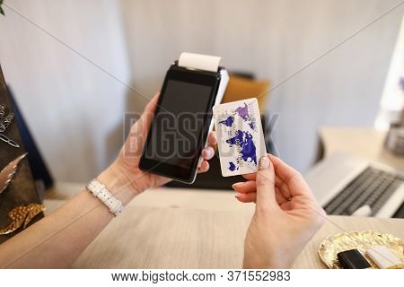 Close Up Female Hands Holding Credit Card Reader. Credit Card With Paypass Technology. Portable Term