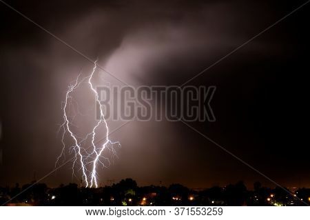 Lightning Strikes At Night During A Severe Thunderstorm Over The City Of Mendoza, Argentina