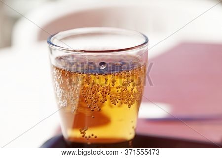 A Cold Beer In The Summer Heat At An Outdoor Restaurant