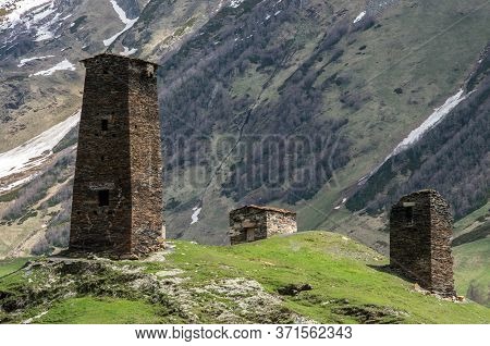 Medieval Stone Towers In The Background Of Mountains. Upper Svanetia Region.